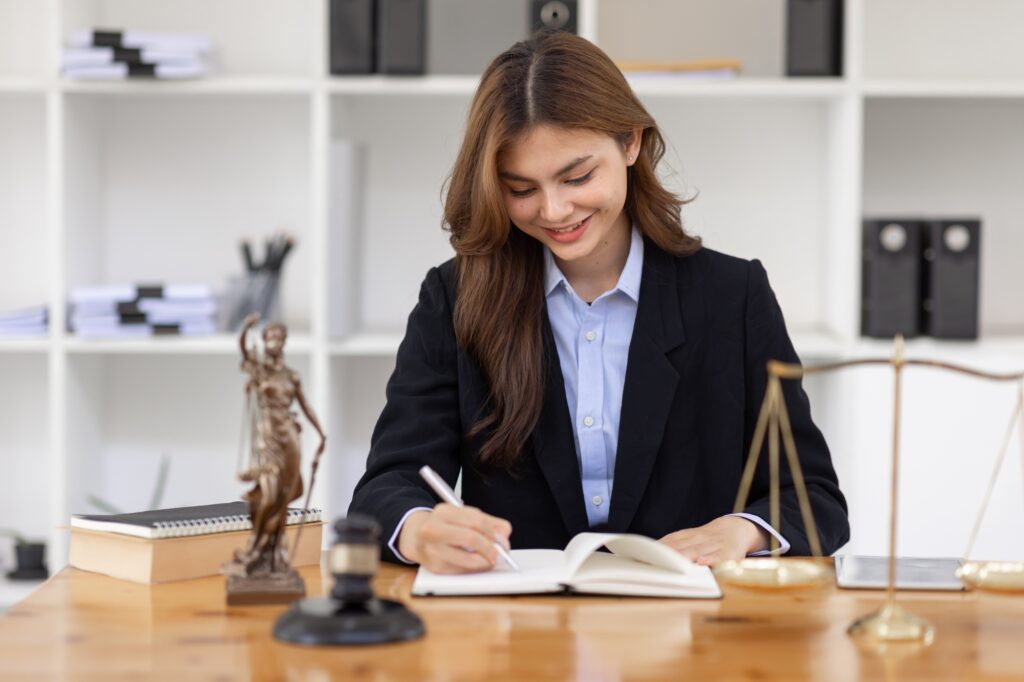 female lawyers working at the law firms. Judge gavel with scales of justice. Legal law, lawyer,